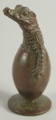 A JAPANESE BRONZE OKIMONA of a baby crocodile.