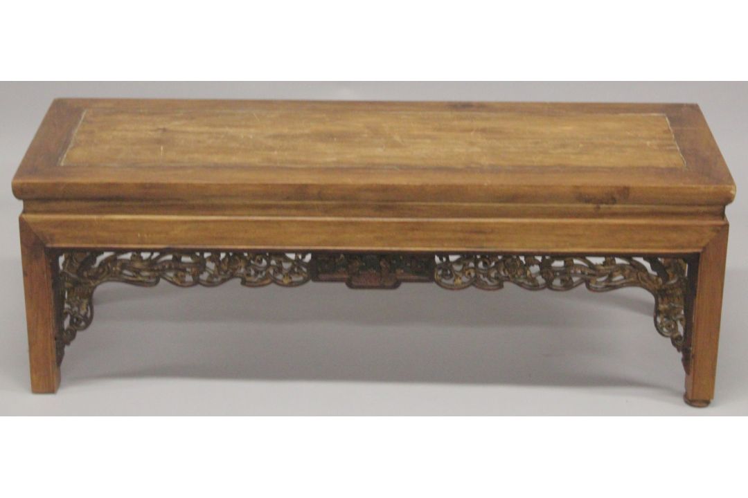 A CHINESE REDWOOD OPIUM TABLE 4ft long, 1ft4ins high. - Image 1 of 3