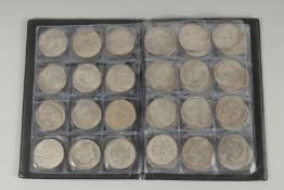 A BOOK OF 72 REPLICA COINS.