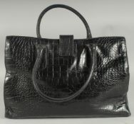A LARGE JAEGER BLACK LEATHER BAG with short handles. 37cm long, 26cm high 12cm deep with Jaeger