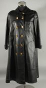 A SUPERB CHANEL BLACK LEATHER LADIES COAT with Chanel double C gilt buttons, silk lining, Chanel