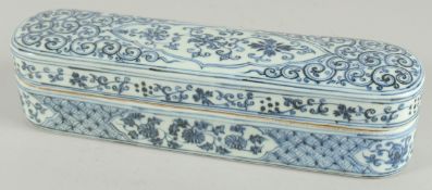 A CHINESE BLUE AND WHITE PORCELAIN PEN BOX. 32cm long.