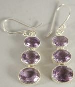 A PAIR OF SILVER AMETHYST DROP EARRINGS.