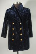 A CHANEL NAVY CRUSHED VELVET JACKET with silk lining and Chanel buttons. Size 42.