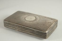 A RECTANGULAR DUTCH SILVER TOBACCO BOX. 5ins long.