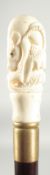 A WALKING STICK WITH CARVED BONE HANDLE 'Rat'.