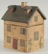 A REPLICA WOODEN HOUSE TEA CADDY. 8.5ins high.