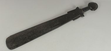 A GOOD 19TH CENTURY SOUTH SEAS CARVED PADDLE. 29ins long.