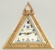 A CERVINE SILVER GILT TRIANGULAR MASONIC WATCH. 2ins.