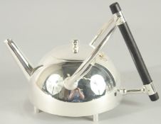 A CHRISTOPHER DRESSER DESIGN, SILVER PLATED CIRCULAR TEA POT.