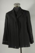 A CHANEL BLACK JACKET, 100% wool , unlined, with striped detail. Size label removed, approx. UK 12 -