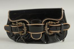 A SMALL FENDI BLACK AND GILT PATENT BAG the front with three buckles. 8ins long, 5ins high.