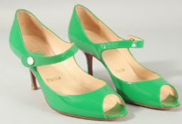 A PAIR OF CHRISTIAN LOUBOUTAIN GREEN PATENT OPEN TOE SHOES Size 37.5.