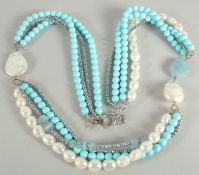 A FRESHWATER PEARL, TURQUOISE HEMATITE NECKLACE.