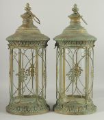 A PAIR OF GREEN ROUND LANTERNS. 22ins high.