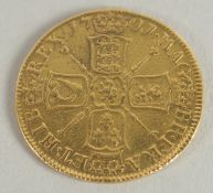A 1701 GOLD GUINEA.