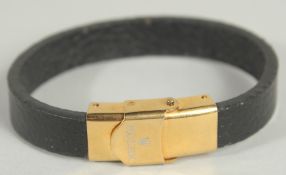 A SMALL ROLEX LEATHER AND GILT BRACELET. 5.5cm.