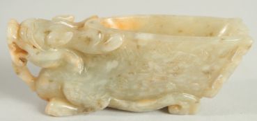 A SMALL CHINESE JADE DRAGON CUP. 3.5ins high.