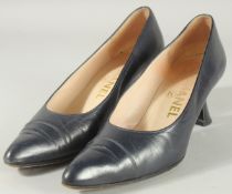 A PAIR OF CHANEL NAVY LEATHER SHOES. SIZE 38.