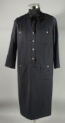 A CHANEL NAVY BLUE WOOL DRESS with Chanel four leaf clover buttons. Size label removed approx. size,