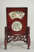 A MINIATURE CHINESE TABLE SCREEN with painted panels.