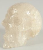 A ROCK CRYSTAL SKULL. 3.5ins high.