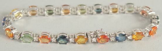 AN 18 CARAT WHITE GOLD NATURAL MULTI-COLOURED SAPPHIRE AND DIAMOND BRACELET.