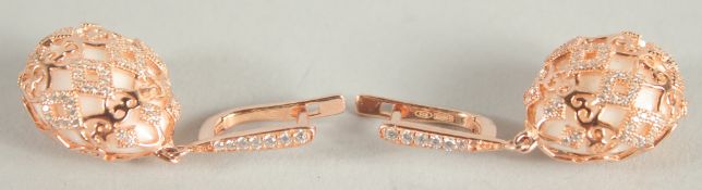 A PAIR OF TATIANA FABERGE ROSE GOLD AND SILVER FILIGREE EARRINGS.