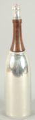 A SILVER PLATED BOTTLE COCKTAIL SHAKER. 15ins high.