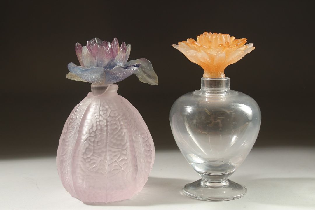 TWO DAUM GLASS SCENT BOTTLES with coloured flower stopper, (one a/f). - Image 1 of 5