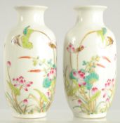 A SMALL PAIR OF CHINESE REPUBLIC VASES painted with flowers. 4.5ins high.