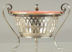 A GOOD RUSSIAN SILVER AND PINK ENAMEL BOWL inset with a medallion on three curving legs. 3.5ins