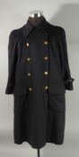 A CHANEL NAVY WOOL COAT with Chanel gilt buttons, three quarter length sleeves, silk lining. Size UK