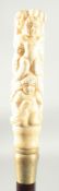 A WALKING STICK WITH CARVED BONE HANDLE ' Nude'.