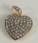 A VICTORIAN YELLOW GOLD ROSE CUT DIAMOND HEART SHAPED PENDANT.