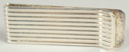 A TIFFANY SILVER NOVELTY CLIP, 5cm long in a Tiffany case.