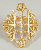 A GOOD 18CT GOLD LALAOUNIS FOLDING RING.