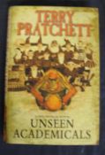 PRATCHETT (Terry) Unseen Academicals, signed, Doubleday, 2009, d.w., 1st edition.