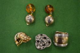 Decorative ear clips.