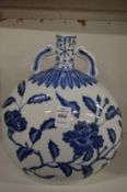 A Chinese blue and white moon flask.