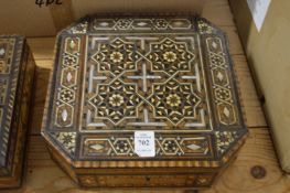 An Eastern inlaid wooden box.