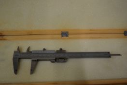 Boxed Vernier caliper.