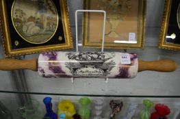 A lustre ware rolling pin.