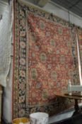 A large Kilim carpet (faults) 295cm x 230cm.