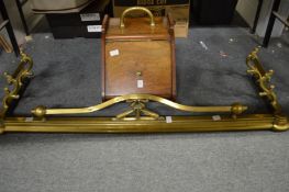 A Victorian walnut coal box and a Victorian brass fire guard.