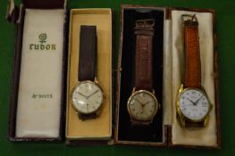 A Tudor gentlemans 9ct gold cased wrist watch with engraved presentation inscription together with