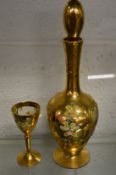 A Venetian glass decanter and a small goblet.