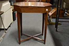 A small mahogany work table.