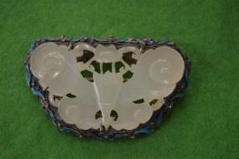 A Chinese jade and enamelled silver brooch in the form of a butterfly.