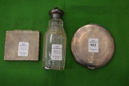 Two silver compacts and a silver mounted cut glass jar.